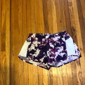 Purple and white patterned athletic shorts